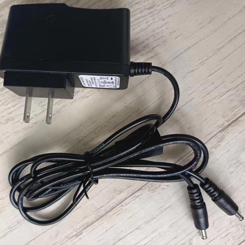 Cargador estándar de EE.UU. 8.4V 1.2A con dos cabezas de CC para batería de guante caliente