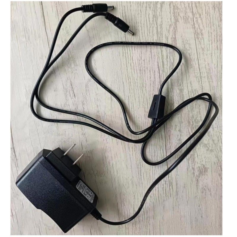 Cargador estándar de EE.UU. 8.4V 1.2A con dos cabezas de CC para batería de guante caliente